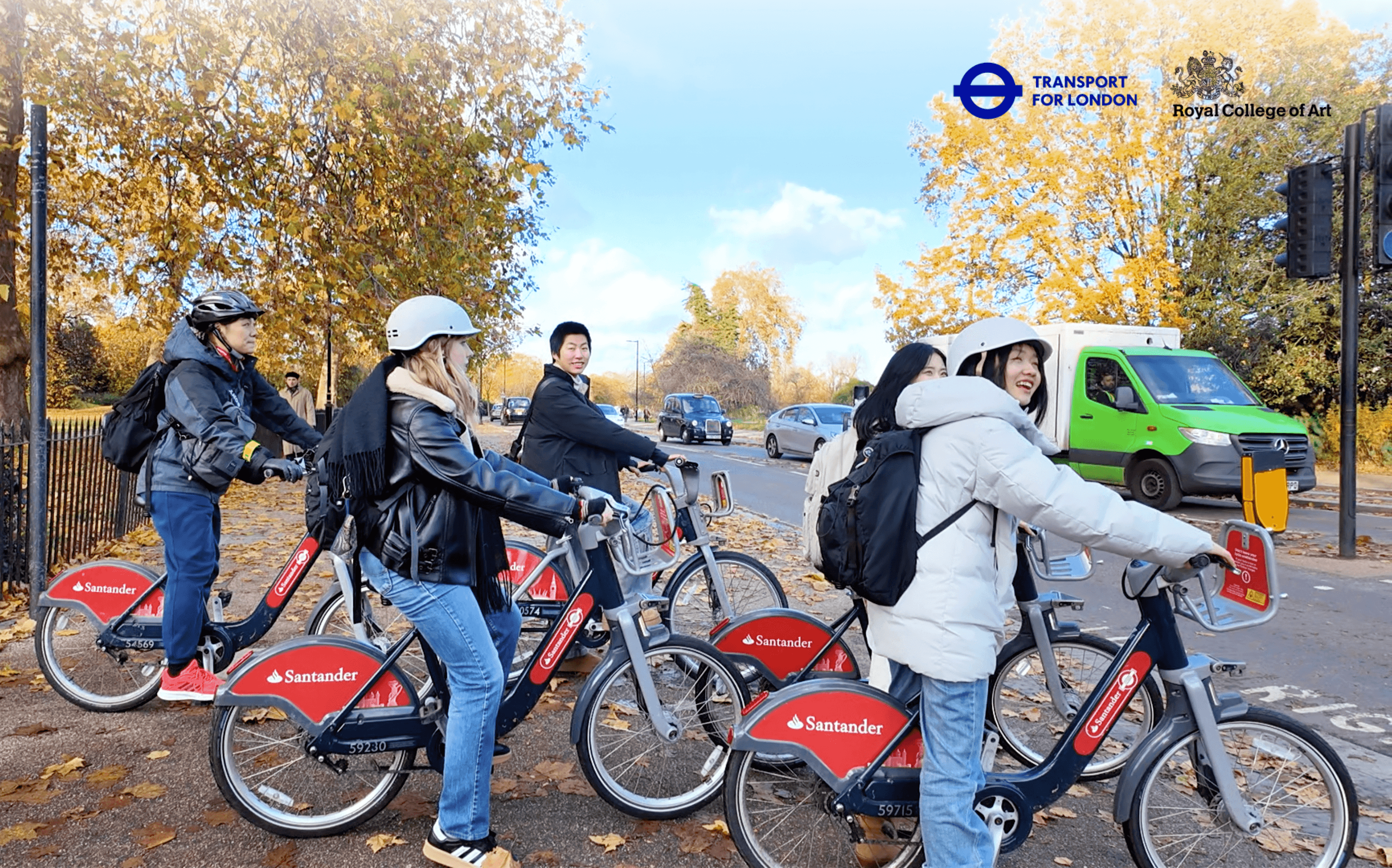 Women students cycling together in London during a Cycle Venner activity.