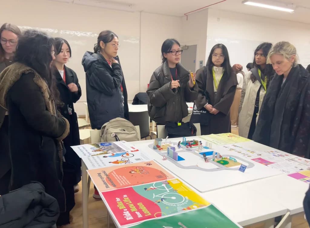 Visitors reviewing the Cycle Venner service concept during the college open day.